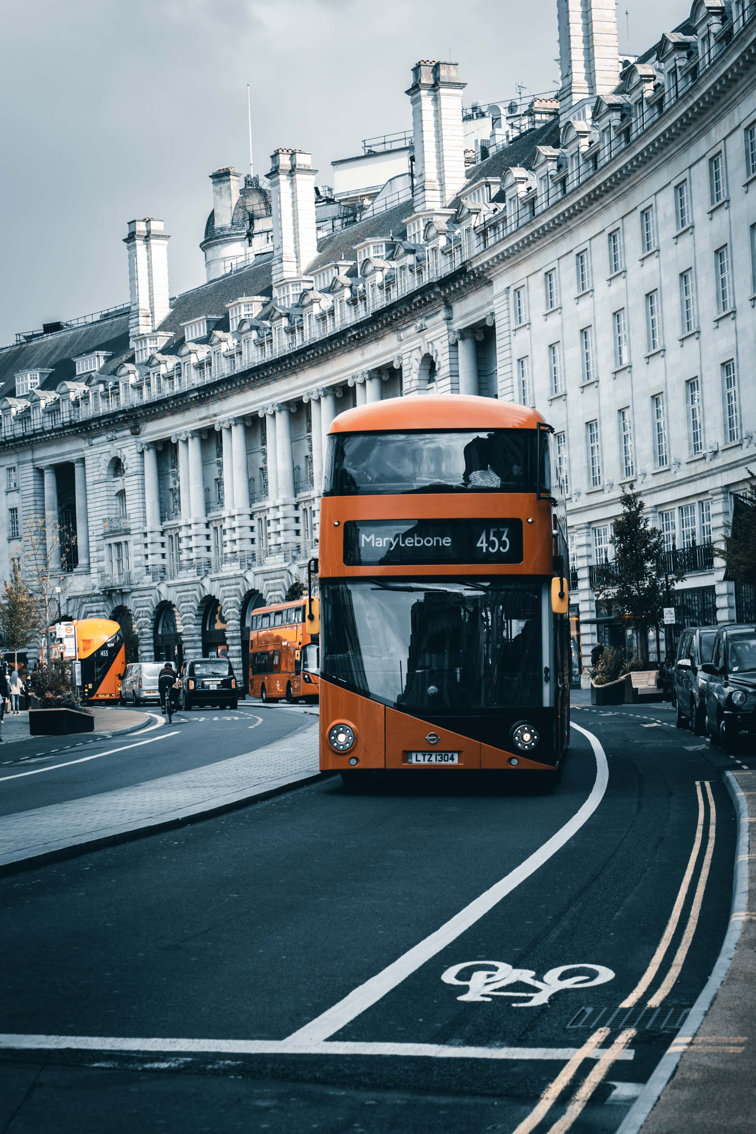 London double decker bus 453 in front of Georgian terrace